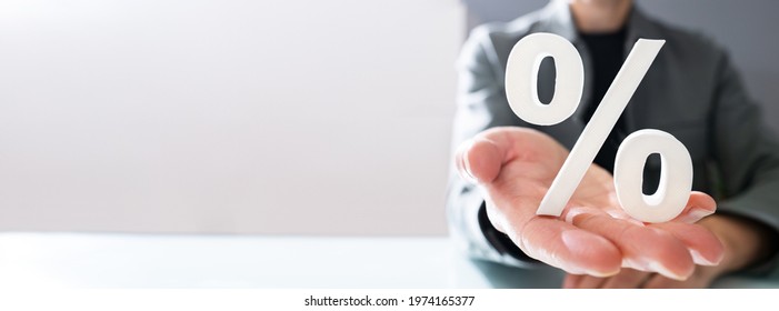 Discount Percentage Sign. Hand Showing Discount Percent - Shutterstock ID 1974165377