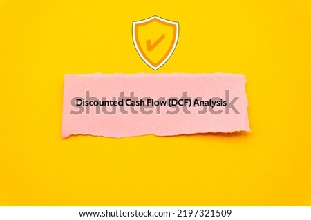 Discounted Cash Flow DCF Analysis.The word is written on a slip of colored paper. Insurance terms, health care words, Life insurance terminology. business Buzzwords.