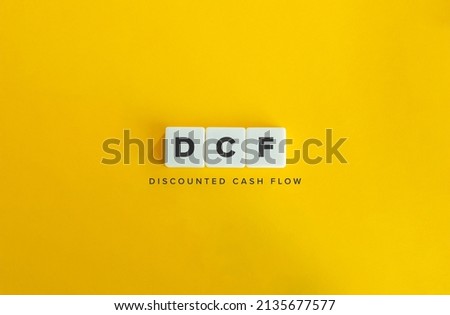 Discounted Cash Flow (DCF) Banner. Letter Tiles on Yellow Background. Minimal Aesthetics.