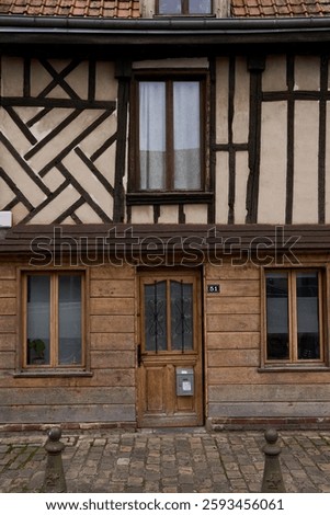 Discover and explore this unique timberframed house that beautifully showcases traditional architecture and style