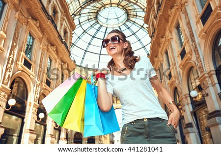 Similar – Image, Stock Photo A woman iis looking at her smartphone outdoors.