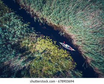 Discovering Danube Delta In A Canoe. Aerial View With A Drone.