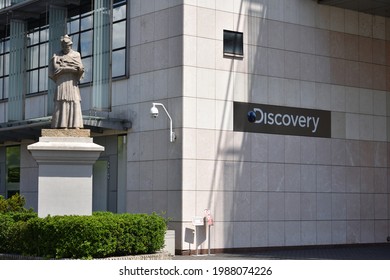 Discovery Channel Logo, Emblem, Sign, Signage On The Facade Of TV Station. WARSAW, POLAND - JUNE 6, 2021