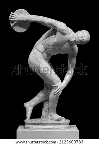 Discus thrower discobolus statue. A part of the ancient Olymp games. A Roman copy of the lost bronze Greek sculpture. Isolated on black background