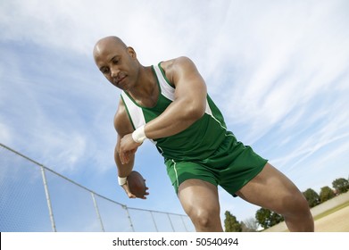 Discus Thrower Preparing to Throw - Powered by Shutterstock