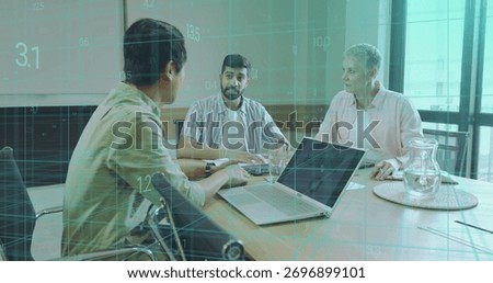Discussing data overlays, three professionals analyzing reports at meeting table with laptops. Collaboration, analytics, teamwork, modernoffice, businessmeeting, digitalwork, professional