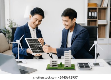 Discussion among businesspeople on the latest developments in solar cell panel technology and Solar Energy Environment city Concept. green Energy
 - Powered by Shutterstock