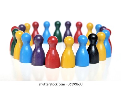 Discussion forum of multicolored toy figures on white background