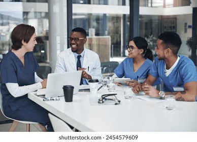 Discussion, laptop and team of doctors in office for medical treatment, diagnosis or surgery planning in clinic. Meeting, computer and surgeon with group of healthcare interns learning in hospital. - Powered by Shutterstock