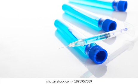 Disease Outbreak. Medical Syringe With Needle For Protection Flu Virus And Coronavirus. Covid Vaccine On White. Syringe, Medical Injection