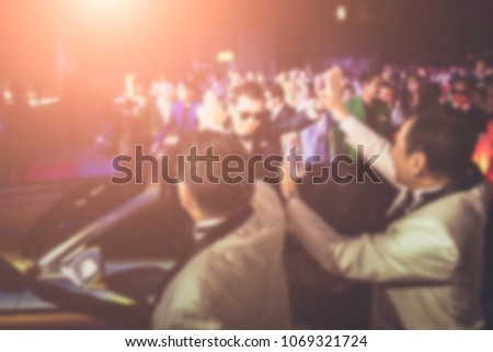 Disfocus of the businessman on sport car in the award ceremony theme creative. background for success business concept