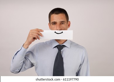 Disgruntled, Unsatisfied Employee With Artificial Smile