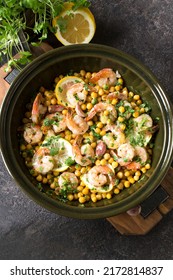 A Dish Of Baked Chickpeas With Shrimps On The Table