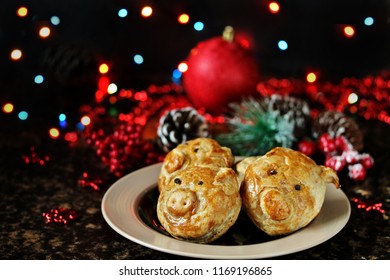 dish to celebrate the beginning of the new year 2019 -year of the pig. pig snout from dough. Pies or cookies in the form of pigs from puff pastry. a traditional dish in Germany is a happy pig. 