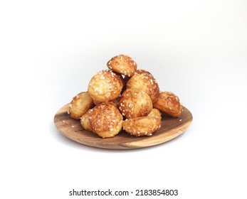 dish of Chouquettes with white background