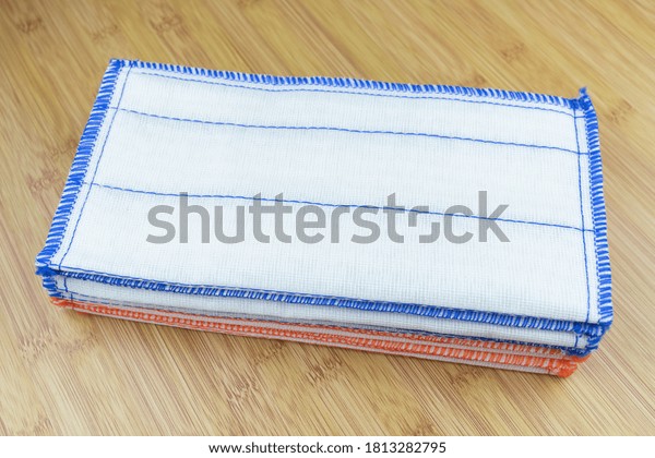Dish cloth on wooden\
table