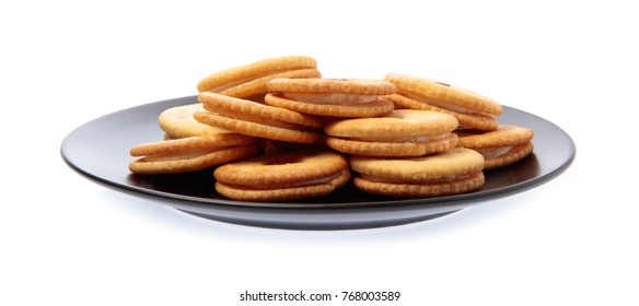 dish of cracker cookies isolated on white background