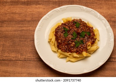 Dish Of Delicious Italian Penne Pasta With Bolognese Ragu Sauce,