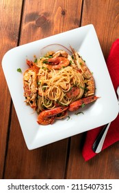 Dish Of Delicious Spaghetti With Scampi And Shrimp Sauce, Italian Cuisine 