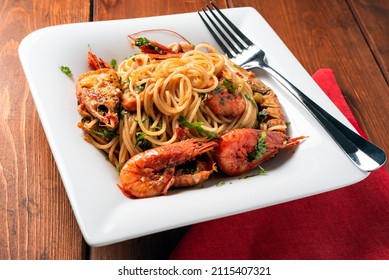 Dish Of Delicious Spaghetti With Scampi And Shrimp Sauce, Italian Cuisine 