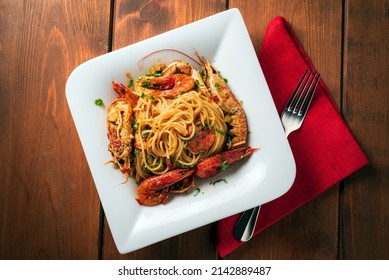 Dish Of Delicious Spaghetti With Shrimp And Scampi Sauce, Italian Cuisine 