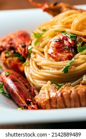 Dish Of Delicious Spaghetti With Shrimp And Scampi Sauce, Italian Cuisine 