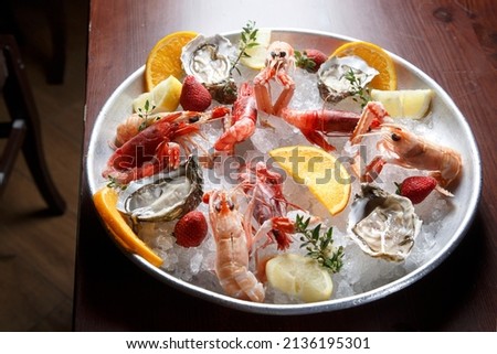 dish detail of raw fish and seafood