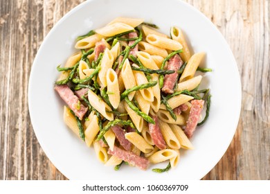 Dish Of Italian Pasta With Pork Sausage And Asparagus 