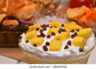 Dish Of Lemon Trifle With Chocolate Chips And Whipped Topping. 