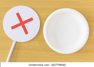 Dish On The Table And False Sign