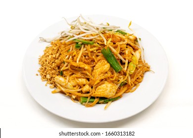 Dish Of Pad Thai On White Background.Pad Thai Or Phad Thai, Is A Stir-fried Rice Noodle Dish Commonly Served As A Street Food And At Most Restaurants In Thailand As Part Of The Country's Cuisine.