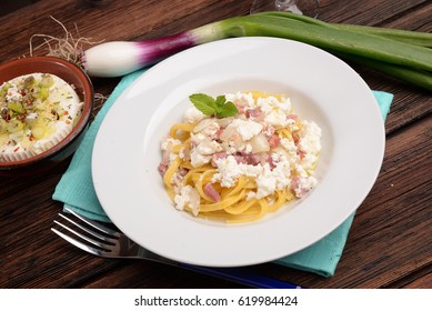 Dish Of Pasta Noodles With Cottage Cheese Bacon And Onion Shallot