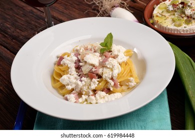 Dish Of Pasta Noodles With Cottage Cheese Bacon And Onion Shallot