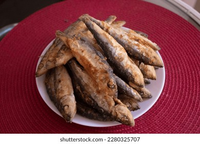 Dish plate with traditional fried fish food - Shutterstock ID 2280325707