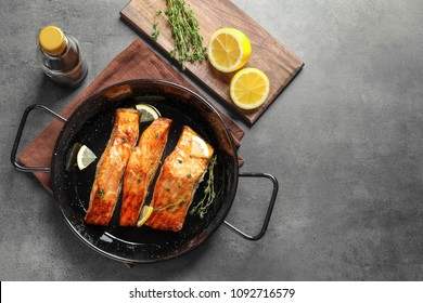 Dish With Tasty Cooked Salmon On Table, Top View