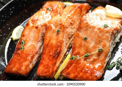 Dish with tasty freshly cooked salmon, closeup - Shutterstock ID 1090520900