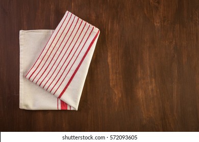 Dish Towel On A Wood Background.