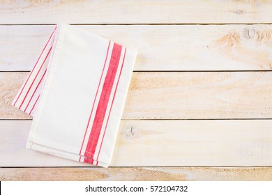 Dish Towel On A Wood Background.