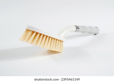 dish washing brush isolated on white background - Shutterstock ID 2395461149
