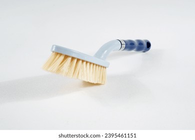 dish washing brush isolated on white background - Shutterstock ID 2395461151