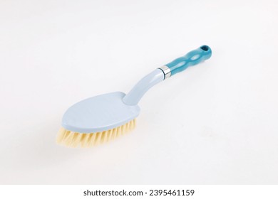 dish washing brush isolated on white background - Shutterstock ID 2395461159