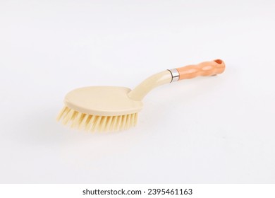 dish washing brush isolated on white background - Shutterstock ID 2395461163