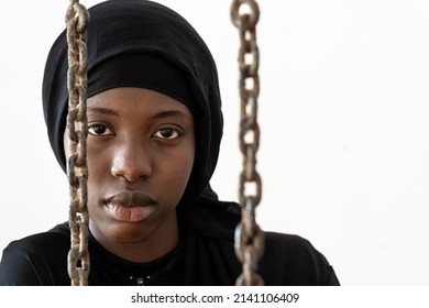 Disheartened sad African Young Girl concerned about her destiny.Forced Marriage,Rights Denied and Human Trafficking issues. - Shutterstock ID 2141106409