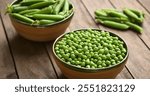 Dishes with fresh green peas