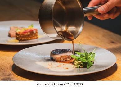 Dishes are prepared in a Michelin-starred restaurant - Powered by Shutterstock