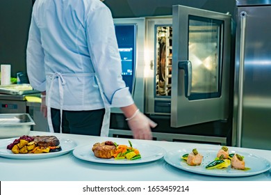 Dishes Are Served In The Restaurant. Plates Of Food On The Table. Cafe. Restaurant. Public Catering Enterprises. Equipment For Restaurants. Menu. Professional Oven. Cook's Job.