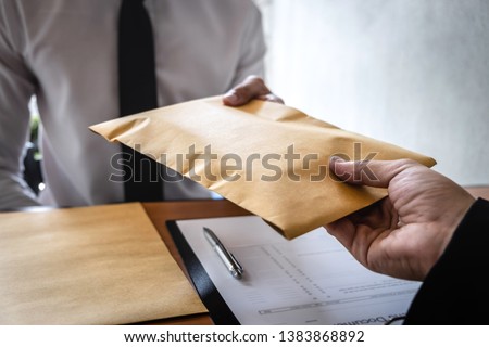 Dishonest cheating in business illegal money, Businessman receive bribe money in envelope to business people to give success the deal contract of investment, Bribery and corruption concept.