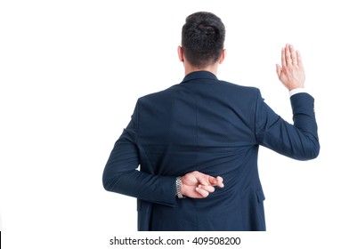 Dishonest lawyer making fake oath or pledge with fingers crossed behind back