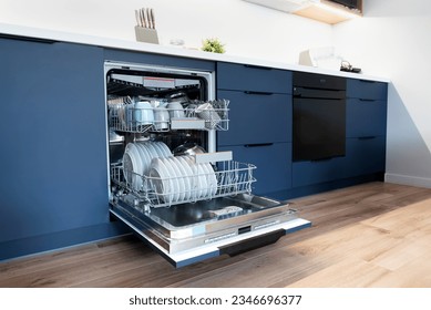 Dishwasher in modern kitchen. Perfectly washing dishes