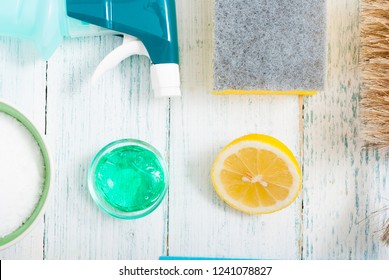 Dishwashing Products On White Wood Table